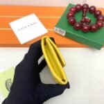 Goyard Bags The p65 G513 Marigny Coin Purse is perfect storing small change. It features snap closure, compartment coins, a slot for cards and banknotes.Size: 8.5*2*10cm. Color: Yellow - Image 5