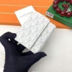 Goyard Bags The G513 Marigny Coin Purse is perfect storing small change. It features snap closure, compartment coins, a slot for cards and banknotes.Size: 8.5*2*10cm. Color: White - Image 3