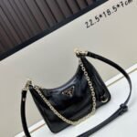 Prada Bags Batch 310 Lacquered Cowhide with Box Re－Edition NaplaK Prada Women's Shoulder or Crossbody Bag Size 22.5X18.5X7CM A bag that recreates the style grids 2005. Prada's design codes are condensed into versatile silhouettes, creating a dialogue between past present styles. Adjustable shoulder strap, parts, detachable key ring, exquisite simple leather item. The triangular logo of enamel metal exudes an iconic and charming design.