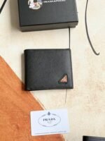 Prada Bags 75PRADA Men's Short Wallet Counter Latest Style, Official Website Synchronization, Genuine Development, Model 2M0513 # Color as shown, blue. The blue leather texture is excellent, with threaded lining. Imported white steel hardware accessories feature a complex color-blocking design, making it more fashionable and unique. Dimensions: Length 11cm, Height 9cm