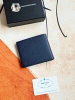 Prada Bags 75PRADA Men's Short Wallet Counter Latest Style, Official Website Synchronization, Genuine Development, Model 2M0513 # Color as shown, blue. The blue leather texture is excellent, with threaded lining. Imported white steel hardware accessories feature a complex color-blocking design, making it more fashionable and unique. Dimensions: Length 11cm, Height 9cm - Image 2