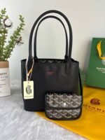 Goyard Bags 165 Goyard Bag is leather version of iconic Saint Louis bag, with Goyardine canvas lining.It offers two different aesthetic styles.Its gradually thickened handle provides a good grip comfortable feel.The compact and small form factor makes Anjou Mini perfect for nighttime use or carrying some daily essentials during the day. Style number: 98196 Color: Black Size: 9cm x 19.5cm - Image 5