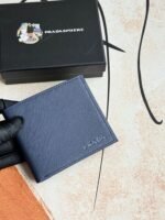 Prada Bags 75PRADA Men's Short Wallet Counter Latest Style, Official Website Synchronization, Genuine Development, Model 2M0513 # Color as shown, blue. The blue leather texture is excellent, with threaded lining. Imported white steel hardware accessories feature a complex color-blocking design, making it more fashionable and unique. Dimensions: Length 11cm, Height 9cm - Image 3