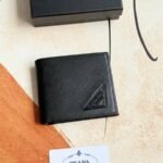 Prada Bags 75PRADA Men's Short Wallet Counter Latest Style, Official Website Synchronization, Genuine Development, Model 2M0513 # Color as shown, blue. The blue leather texture is excellent, with threaded lining. Imported white steel hardware accessories feature a complex color-blocking design, making it more fashionable and unique. Dimensions: Length 11cm, Height 9cm