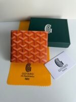 Goyard Bags 50SAINT-FLORENTIN wallet has exquisite compact design that used store cards, banknotes, documents, coins. Its secured by an ultra-flat clasp engraved with the GOYARD logo.Its size is just right to fit bag, and it can also be placed in a jacket pocket or pants pocket. 12 2.4 x 10.5 cm 80% off Wallet-Orange - Image 3