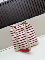 Prada Bags Batch 230 Prada New Products Let's Check Out This Season's Super Eye-catching Bags Canvas Striped Mariner Bucket Handbag, Red and White Stripes Woven Handle ~ Large capacity, ultra-lightweight, especially suitable for commuting! color scheme also suits vacation well⛱ The bag design is very thoughtful with metal rings on both sides, allowing you to hang your favorite doll pendants freely ​ Dimensions 26x28x12, model 2548 - Image 3