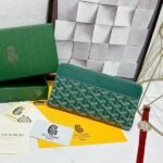 Goyard Bags 90 Goya Matignon Large Wallet is designed as long style with full closure security.It contains 12 card slots, a central zipper pocket, two large storage compartments for cards, banknotes, coins, and other daily documents. Style number: 98188 Color: Green Size: 20cm 2.3cm x 11cm