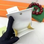 Goyard Bags The G513 Marigny Coin Purse is perfect storing small change. It features snap closure, compartment coins, a slot for cards and banknotes.Size: 8.5*2*10cm. Color: White - Image 7