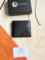 Prada Bags 75PRADA Men's Short Wallet Counter Latest Style, Official Website Synchronization, Genuine Development, Model 2M0513 # Color as shown, blue. The blue leather texture is excellent, with threaded lining. Imported white steel hardware accessories feature a complex color-blocking design, making it more fashionable and unique. Dimensions: Length 11cm, Height 9cm