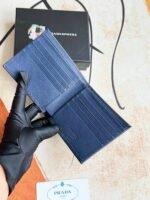 Prada Bags 75PRADA Men's Short Wallet Counter Latest Style, Official Website Synchronization, Genuine Development, Model 2M0513 # Color as shown, blue. The blue leather texture is excellent, with threaded lining. Imported white steel hardware accessories feature a complex color-blocking design, making it more fashionable and unique. Dimensions: Length 11cm, Height 9cm - Image 6