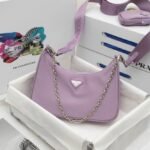 Prada Bags 185 Return Top Original Prada New Nylon Handbag/Underarm Bag trendy bag from internet-famous sister group now available in new style! This Hobo bag's design fantastic three uses: waist bag/crossbody/single The handle been replaced chain, adding touch of sexiness underarm bag. comes long strap. What I love most is the shoulder strap has a small pendant pouch that can also be hung on other bags or pants as an accessory. It goes well with various outfits. Hurry up and get it, it's so beautiful! Model: pD001, Dimensions: Length 22X Height 18x Bottom 6.5cm