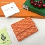 Goyard Bags The G513 Marigny Coin Purse is perfect storing small change. It features snap closure, compartment coins, a slot for cards and banknotes.Size: 8.5*2*10cm. Color: Orange