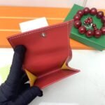 Goyard Bags The p65 G513 Marigny Coin Purse is perfect storing small change. It features snap closure, compartment coins, a slot for cards and banknotes.Size: 8.5*2*10cm. Color: Bright Red - Image 7