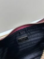 Prada Bags Batch 310 Lacquered Cowhide with Box Re－Edition NaplaK Prada Women's Shoulder or Crossbody Bag Size 22.5X18.5X7CM A bag that recreates the style grids 2005.Prada's design codes are condensed into versatile silhouettes, creating a dialogue between past present styles.Adjustable shoulder strap, parts, detachable key ring, exquisite simple leather item.The triangular logo of enamel metal exudes an iconic and charming design. - Image 8