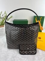 Goyard Bags 180 Goya Bohème Hobo bag epitome of lightness, flexibility, and security, thanks zipper closure.Due to its wide handle, it is very comfortable as shoulder bag.It also features the iconic detachable pouch that can be closed with a snap button. Style number: 98666 Color: Black Dimensions: 43cm 14cm x 27cm