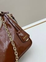 Prada Bags Batch 310 Lacquered Cowhide with Box Re－Edition NaplaK Prada Women's Shoulder or Crossbody Bag Size 22.5X18.5X7CM A bag that recreates the style grids 2005.Prada's design codes are condensed into versatile silhouettes, creating a dialogue between past present styles.Adjustable shoulder strap, parts, detachable key ring, exquisite simple leather item.The triangular logo of enamel metal exudes an iconic and charming design. - Image 6