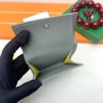 Goyard Bags The G513 Marigny Coin Purse is perfect storing small change. It features snap closure, compartment coins, a slot for cards and banknotes.Size: 8.5*2*10cm. Color: Gray - Image 7