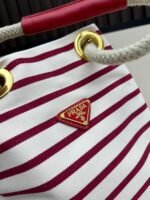 Prada Bags Batch 230 Prada New Products Let's Check Out This Season's Super Eye-catching Bags Canvas Striped Mariner Bucket Handbag, Red and White Stripes Woven Handle ~ Large capacity, ultra-lightweight, especially suitable for commuting! color scheme also suits vacation well⛱ The bag design is very thoughtful with metal rings on both sides, allowing you to hang your favorite doll pendants freely ​ Dimensions 26x28x12, model 2548 - Image 4