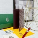 Goyard Bags 85 Goya Multifunctional Travel Wallet Holder, with 1 Main Compartment, Side Compartments, 2 Ticket Dividers, 9 Card Slots, Combining Fashion and Multifunctionality, Can Store Tickets, Cash, Passport, Various Bank Cards, etc. Style number: 98129 Color: Wine Red Size: 19cm 1.5cm x 11.5cm - Image 3