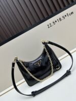 Prada Bags Batch 310 Lacquered Cowhide with Box Re－Edition NaplaK Prada Women's Shoulder or Crossbody Bag Size 22.5X18.5X7CM A bag that recreates the style grids 2005. Prada's design codes are condensed into versatile silhouettes, creating a dialogue between past present styles. Adjustable shoulder strap, parts, detachable key ring, exquisite simple leather item. The triangular logo of enamel metal exudes an iconic and charming design. - Image 5