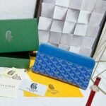 Goyard Bags 90 Goya Matignon Large Wallet is designed as long style with full closure security.It contains 12 card slots, a central zipper pocket, two large storage compartments for cards, banknotes, coins, and other daily documents. Style number: 98188 Color: Blue Size: 20cm 2.3cm x 11cm