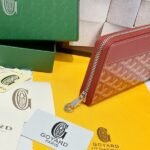 Goyard Bags 90 Goya Matignon Large Wallet is designed as long style with full closure security.It contains 12 card slots, a central zipper pocket, two large storage compartments for cards, banknotes, coins, and other daily documents. Style number: 98188 Color: Red Size: 20cm 2.3cm x 11cm - Image 4