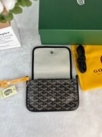 Goyard Bags 150 Goya Plumet Clutch Bag has wallet function design that store coins, banknotes, and cards. It can also paired with shoulder strap be worn crossbody like a small bag.Its 3 independent pocket system adapts perfectly to its contents, showcasing an elegant style. Style number: 98638 Color: Black Dimensions: 20.5cm 2.5cm x 14cm - Image 3