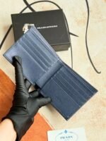 Prada Bags 75PRADA Men's Short Wallet Counter Latest Style, Official Website Synchronization, Genuine Development, Model 2M0513# Color as shown, blue. The blue leather texture is excellent, with threaded lining. Imported white steel hardware accessories feature a complex color-blocking design, making it more fashionable and unique. Dimensions: Length 11cm, Height 9cm - Image 4