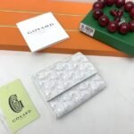 Goyard Bags The p65 G513 Marigny Coin Purse is perfect storing small change. It features snap closure, compartment coins, a slot for cards and banknotes.Size: 8.5*2*10cm. Color: White