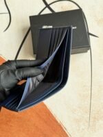 Prada Bags 75PRADA Men's Short Wallet Counter Latest Style, Official Website Synchronization, Genuine Development, Model 2M0513 # Color as shown, blue. The blue leather texture is excellent, with threaded lining. Imported white steel hardware accessories feature a complex color-blocking design, making it more fashionable and unique. Dimensions: Length 11cm, Height 9cm - Image 6