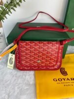 Goyard Bags 150 Goya Plumet Clutch Bag has wallet function design that store coins, banknotes, and cards. It can also paired with shoulder strap be worn crossbody like a small bag.Its 3 independent pocket system adapts perfectly to its contents, showcasing an elegant style. Style number: 98638 Color: Red Dimensions: 20.5cm 2.5cm x 14cm