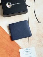 Prada Bags 75PRADA Men's Short Wallet Counter Latest Style, Official Website Synchronization, Genuine Development, Model 2M0513 # Color as shown, blue. The blue leather texture is excellent, with threaded lining. Imported white steel hardware accessories feature a complex color-blocking design, making it more fashionable and unique. Dimensions: Length 11cm, Height 9cm - Image 2