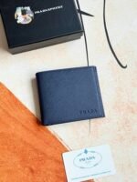 Prada Bags 75PRADA Men's Short Wallet Counter Latest Style, Official Website Synchronization, Genuine Development, Model 2M0513# Color as shown, blue. The blue leather texture is excellent, with threaded lining. Imported white steel hardware accessories feature a complex color-blocking design, making it more fashionable and unique. Dimensions: Length 11cm, Height 9cm