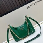 Prada Bags Batch 310 Lacquered Cowhide with Box Re－Edition NaplaK Prada Women's Shoulder or Crossbody Bag Size 22.5X18.5X7CM A bag that recreates the style grids 2005.Prada's design codes are condensed into versatile silhouettes, creating a dialogue between past present styles.Adjustable shoulder strap, parts, detachable key ring, exquisite simple leather item.The triangular logo of enamel metal exudes an iconic and charming design.