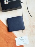 Prada Bags 75PRADA Men's Short Wallet Counter Latest Style, Official Website Synchronization, Genuine Development, Model 2M0513 # Color as shown, blue. The blue leather texture is excellent, with threaded lining. Imported white steel hardware accessories feature a complex color-blocking design, making it more fashionable and unique. Dimensions: Length 11cm, Height 9cm - Image 2