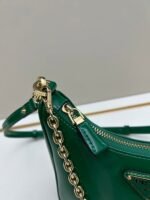 Prada Bags Batch 310 Lacquered Cowhide with Box Re－Edition NaplaK Prada Women's Shoulder or Crossbody Bag Size 22.5X18.5X7CM A bag that recreates the style grids 2005.Prada's design codes are condensed into versatile silhouettes, creating a dialogue between past present styles.Adjustable shoulder strap, parts, detachable key ring, exquisite simple leather item.The triangular logo of enamel metal exudes an iconic and charming design. - Image 6