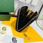 Goyard Bags 90 Goya Matignon Large Wallet is designed as long style with full closure security.It contains 12 card slots, a central zipper pocket, two large storage compartments for cards, banknotes, coins, and other daily documents. Style number: 98188 Color: Black Size: 20cm 2.3cm x 11cm - Image 6